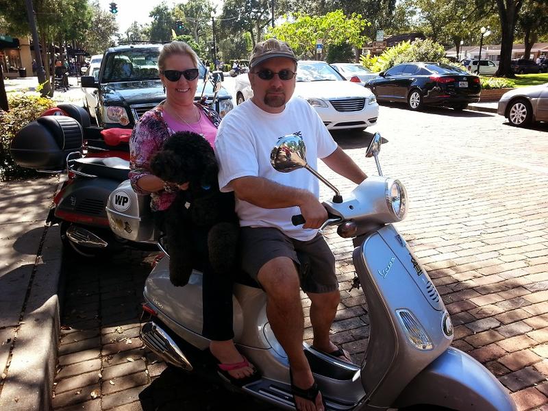 Taking their dog for a ride in Winter Park, FL